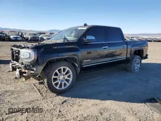 2016 GMC Sierra 1500 Denali z VIN 3GTU2PEJ5GG133865, wystawiony jako Copart lot #78105274 z przebiegiem 128 467 mil mil oraz Szkoda całkowita • Salvage title. Historia ofert i sprzedaży dostępna na DreamBid. Obrazek 1.
