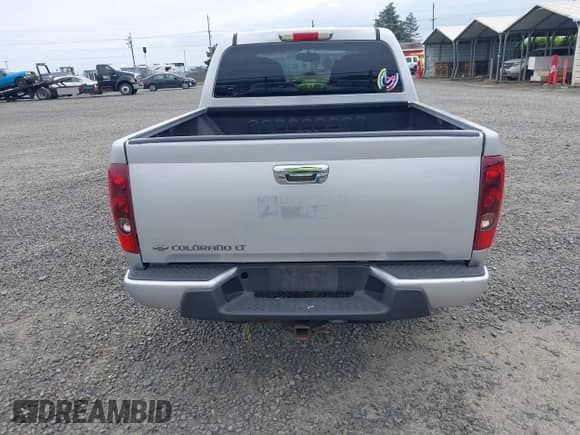 2010 Chevrolet Colorado 1LT z VIN 1GCJTCDEXA8114061, wystawiony jako IAAI lot #42235820 z przebiegiem 218 972 mil mil oraz . Historia ofert i sprzedaży dostępna na DreamBid. Obrazek 17.