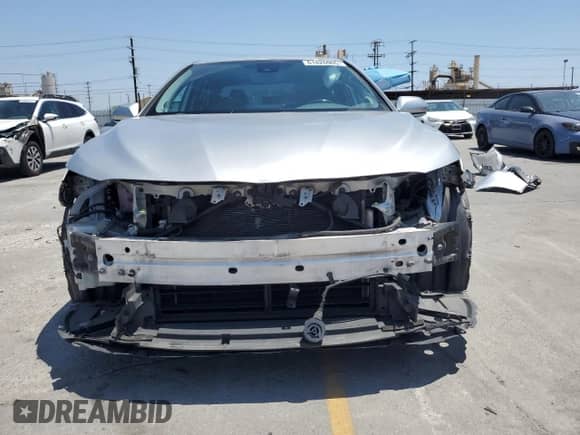 2022 Toyota Camry Hybrid XSE с VIN 4T1K31AK1NU036801, выставлен на аукционе Copart как лот 61826905 с пробегом 113 437 миль миль и Списание • Salvage title. История ставок и продаж доступна на DreamBid. Изображение 5.