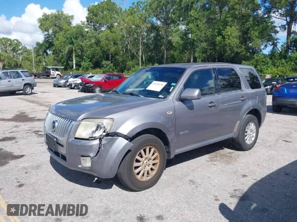 2008 Mercury Mariner Premier with VIN 4M2CU97118KJ53310, listed as a IAAI auction lot 43251176 with 22,170 mi miles and . Bid and sale history available at DreamBid. Image 2.