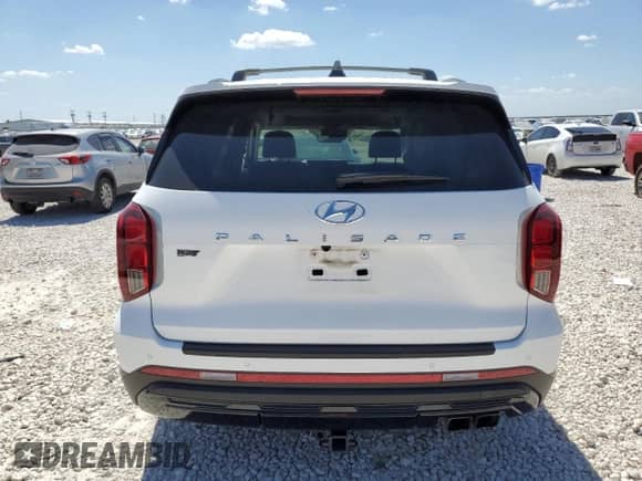 2023 Hyundai Palisade XRT с VIN KM8R34GE7PU556151, выставлен на аукционе Copart как лот 67518644 с пробегом 33 553 миль миль и Списание • Salvage title. История ставок и продаж доступна на DreamBid. Изображение 6.