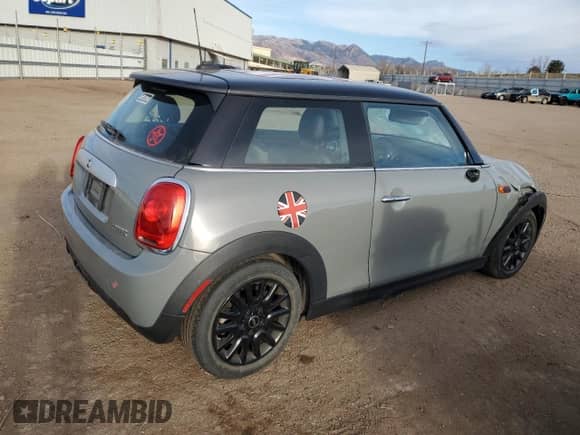 2015 MINI Hardtop with VIN WMWXM5C50FT937233, listed as a Copart auction lot 50077295 with 87,785 mi miles and Salvage title. Bid and sale history available at DreamBid. Image 3.