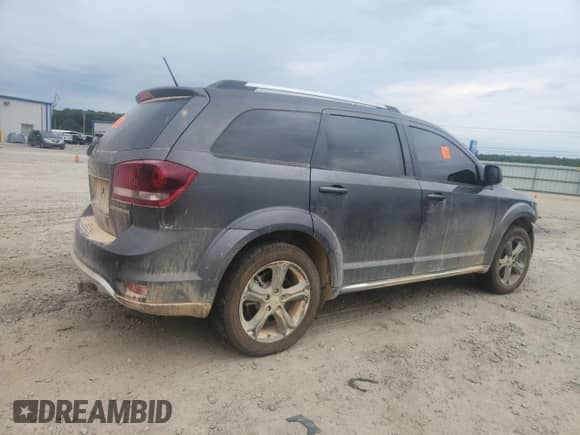 2016 Dodge Journey Crossroad Plus with VIN 3C4PDCGB2GT203285, listed as a Copart auction lot 70141225 with 159,730 mi miles and Salvage title. Bid and sale history available at DreamBid. Image 3.