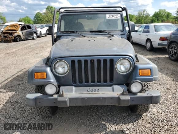 2001 Jeep Wrangler SE with VIN 1J4FA29P41P355548, listed as a Copart auction lot 56214205 with 173,125 mi miles and Clean title. Bid and sale history available at DreamBid. Image 5.