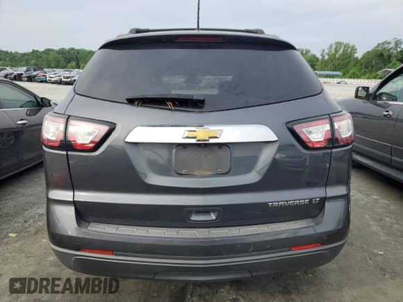 2013 Chevrolet Traverse LT with VIN 1GNKRJKD0DJ177272, listed as a Copart auction lot 58762365 with 71,735 mi miles and Salvage title. Bid and sale history available at DreamBid. Image 6.