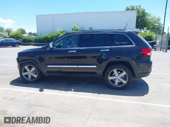 2012 Jeep Grand Cherokee Overland with VIN 1C4RJECG6CC354845, listed as a IAAI auction lot 42345103 with 106,691 mi miles and . Bid and sale history available at DreamBid. Image 14.