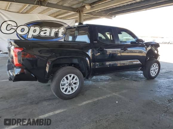 2024 Toyota Tacoma SR5 with VIN 3TMKB5FN9RM023449, listed as a Copart auction lot 67866095 with 5,550 mi miles and Salvage title. Bid and sale history available at DreamBid. Image 3.