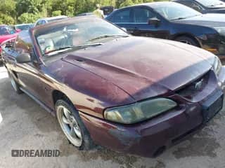 1996 Ford Mustang GT z VIN 1FALP45X4TF108148, wystawiony jako IAAI lot #43023757 z przebiegiem 153 235 mil mil oraz . Historia ofert i sprzedaży dostępna na DreamBid. Obrazek 1.