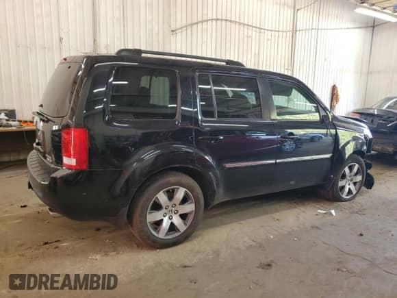 2014 Honda Pilot Touring with VIN 5FNYF4H93EB053490, listed as a Copart auction lot 82048495 with 144,096 mi miles and Salvage title. Bid and sale history available at DreamBid. Image 3.