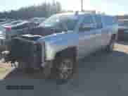 2016 Chevrolet Silverado 1500 LT with VIN 1GCVKREC8GZ229426, listed as a IAAI auction lot 43449954 with 104,294 mi miles and . Bid and sale history available at DreamBid. Image 2.