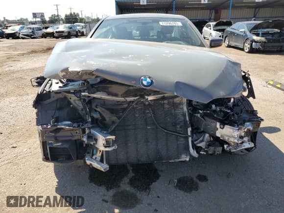 2022 BMW 5 Series 540i xDrive z VIN WBA73BJ01NWX68037, wystawiony jako Copart lot #71298785 z przebiegiem Nie podano mil oraz Szkoda całkowita • Salvage title. Historia ofert i sprzedaży dostępna na DreamBid. Obrazek 5.