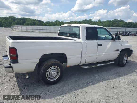 2002 Dodge 2500 with VIN 3B7KC23602M313447, listed as a Copart auction lot 56666355 with 235,214 mi miles and Salvage title. Bid and sale history available at DreamBid. Image 3.