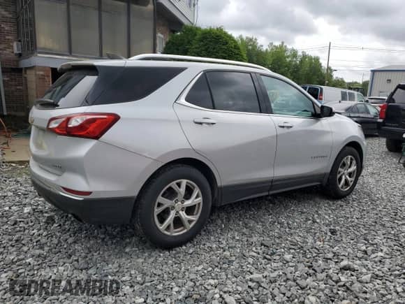 2018 Chevrolet Equinox LT с VIN 2GNAXTEX1J6277960, выставлен на аукционе Copart как лот 61011455 с пробегом 135 650 миль миль и Списание • Salvage title. История ставок и продаж доступна на DreamBid. Изображение 3.
