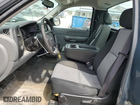 2009 Chevrolet Silverado 1500 Work Truck with VIN 1GCEC14X99Z166164, listed as a Copart auction lot 52852255 with 194,568 mi miles and Salvage title. Bid and sale history available at DreamBid. Image 7.