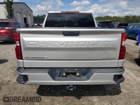 2022 Chevrolet Silverado 1500 Custom with VIN 3GCPDBEK6NG531344, listed as a Copart auction lot 82001335 with 64,129 mi miles and Salvage title. Bid and sale history available at DreamBid. Image 6.