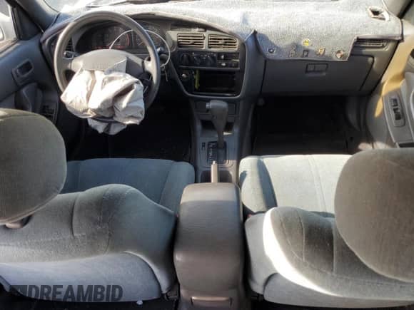 1992 Toyota Camry LE с VIN 4T1SK12E0NU064956, выставлен на аукционе Copart как лот 50665925 с пробегом 228 909 миль миль и Списание • Salvage title. История ставок и продаж доступна на DreamBid. Изображение 8.