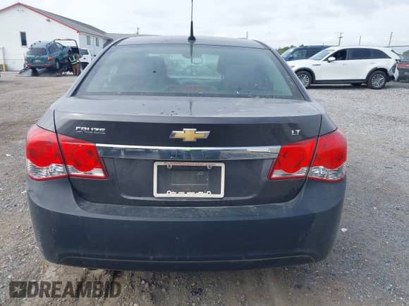 2014 Chevrolet Cruze 1LT with VIN 1G1PC5SB8E7338769, listed as a IAAI auction lot 43186564 with 115,065 mi miles and . Bid and sale history available at DreamBid. Image 16.