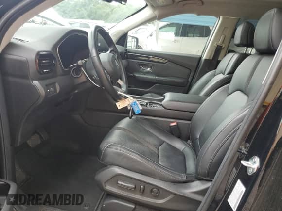 2024 Honda Pilot Touring с VIN 5FNYG2H71RB012426, выставлен на аукционе Copart как лот 67350105 с пробегом 33 343 миль миль и Списание • Salvage title. История ставок и продаж доступна на DreamBid. Изображение 7.