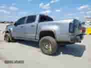 2018 Chevrolet Colorado 4WD ZR2 with VIN 1GCPTEE11J1243686, listed as a Copart auction lot 58235125 with 144,760 mi miles and Salvage title. Bid and sale history available at DreamBid. Image 2.