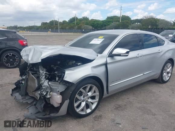 2020 Chevrolet Impala Premier with VIN 1G1105S35LU112811, listed as a IAAI auction lot 42178643 with 98,767 mi miles and . Bid and sale history available at DreamBid. Image 2.