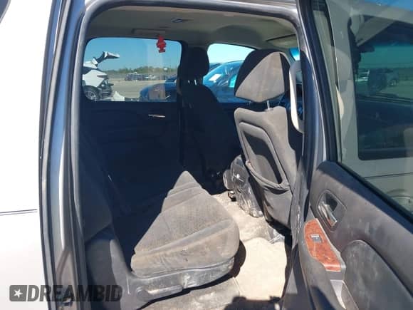 2007 Chevrolet Suburban LT with VIN 3GNFC16057G186159, listed as a IAAI auction lot 43593265 with 166,801 mi miles and . Bid and sale history available at DreamBid. Image 8.