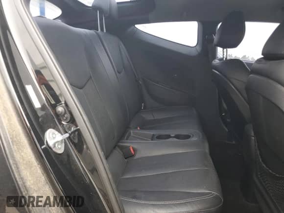 2013 Hyundai Veloster Turbo z VIN KMHTC6AE7DU163868, wystawiony jako Copart lot #89873585 z przebiegiem 80 461 mil mil oraz Czysty tytuł • Clean title. Historia ofert i sprzedaży dostępna na DreamBid. Obrazek 10.