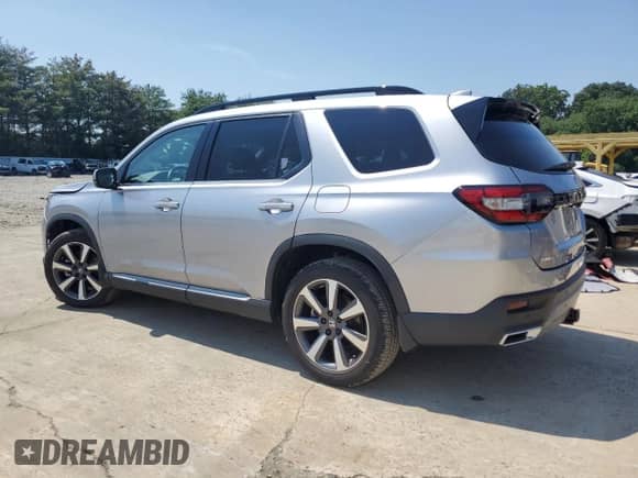 2023 Honda Pilot Touring with VIN 5FNYG1H71PB007444, listed as a Copart auction lot 63273265 with 28,199 mi miles and Salvage title. Bid and sale history available at DreamBid. Image 2.