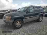 1999 Jeep Grand Cherokee Laredo с VIN 1J4G258S4XC577449, выставлен на аукционе Copart как лот 66556115 с пробегом 220 256 миль миль и Чистый • Clean title. История ставок и продаж доступна на DreamBid. Изображение 1.
