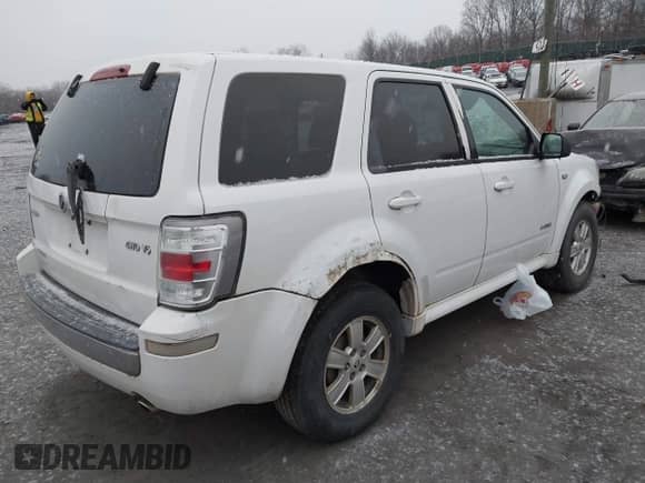 2008 Mercury Mariner with VIN 4M2CU91128KJ03668, listed as a IAAI auction lot 41213830 with 240,480 mi miles and . Bid and sale history available at DreamBid. Image 4.