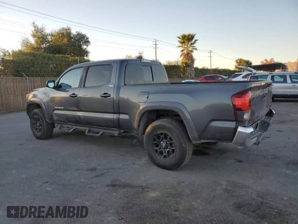 2020 Toyota Tacoma SR5 с VIN 3TMBZ5DN5LM023888, выставлен на аукционе Copart как лот 84208174 с пробегом 131 858 миль миль и Списание • Salvage title. История ставок и продаж доступна на DreamBid. Изображение 2.