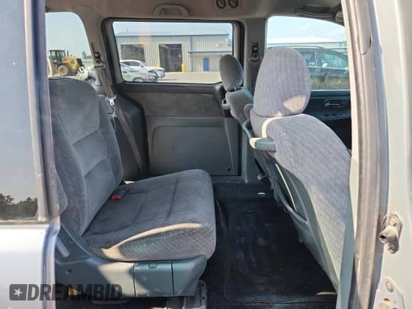 2002 Honda Odyssey LX with VIN 2HKRL18532H504584, listed as a Copart auction lot 67735975 with 230,708 mi miles and Salvage title. Bid and sale history available at DreamBid. Image 11.