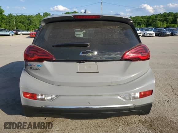 2020 Chevrolet Bolt EV Premier с VIN 1G1FZ6S05L4136257, выставлен на аукционе Copart как лот 55837195 с пробегом 66 248 миль миль и Списание • Salvage title. История ставок и продаж доступна на DreamBid. Изображение 6.