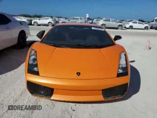 2008 Lamborghini Gallardo с VIN ZHWGU43T78LA07001, выставлен на аукционе Copart как лот 75648814 с пробегом Не указан миль и Списание • Salvage title. История ставок и продаж доступна на DreamBid. Изображение 5.