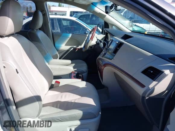 2013 Toyota Sienna XLE with VIN 5TDDK3DCXDS059061, listed as a IAAI auction lot 41777329 with 142,889 mi miles and . Bid and sale history available at DreamBid. Image 5.