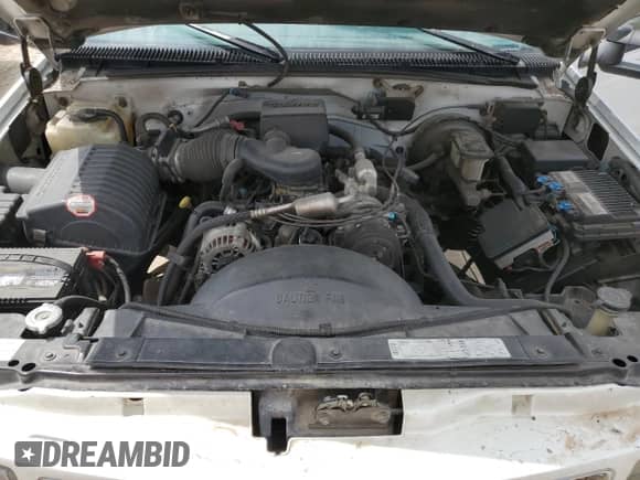1997 GMC Sierra 1500 z VIN 2GTEC19R0V1553263, wystawiony jako Copart lot #52783805 z przebiegiem 230 959 mil mil oraz Szkoda całkowita • Salvage title. Historia ofert i sprzedaży dostępna na DreamBid. Obrazek 11.