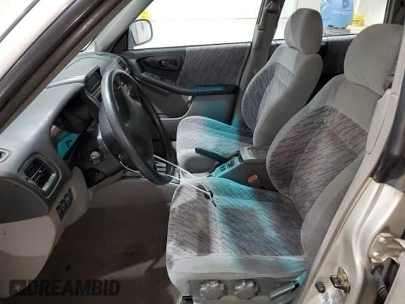 1999 Subaru Forester S with VIN JF1SF6559XH744986, listed as a Copart auction lot 63837855 with 142,530 mi miles and Salvage title. Bid and sale history available at DreamBid. Image 7.