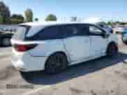 2023 Honda Odyssey Sport z VIN 5FNRL6H78PB029552, wystawiony jako Copart lot #70126185 z przebiegiem 7 443 mil mil oraz Szkoda całkowita • Salvage title. Historia ofert i sprzedaży dostępna na DreamBid. Obrazek 3.