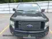 2011 Ford F-150 XLT with VIN 1FTFW1ET3BFA98328, listed as a IAAI auction lot 43017253 with 240,382 mi miles and . Bid and sale history available at DreamBid. Image 12.