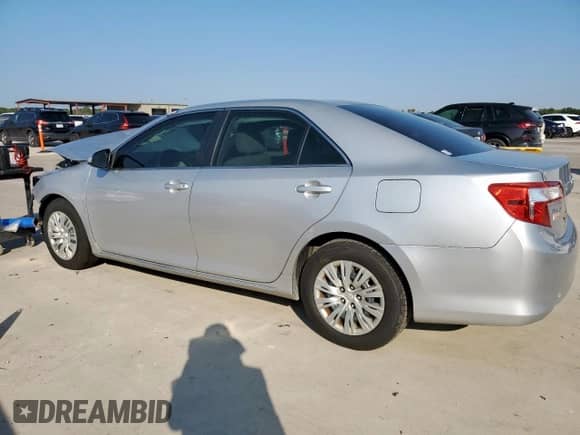2014 Toyota Camry L с VIN 4T4BF1FK6ER350885, выставлен на аукционе Copart как лот 72104345 с пробегом 168 250 миль миль и Списание • Salvage title. История ставок и продаж доступна на DreamBid. Изображение 2.