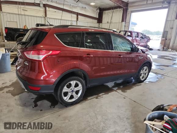 2014 Ford Escape SE z VIN 1FMCU0GXXEUA02550, wystawiony jako Copart lot #71217445 z przebiegiem 97 484 mil mil oraz Szkoda całkowita • Salvage title. Historia ofert i sprzedaży dostępna na DreamBid. Obrazek 3.