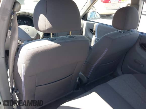 2005 Hyundai Accent GLS с VIN KMHCG45C75U658672, выставлен на аукционе IAAI как лот 42107140 с пробегом 34 351 миль миль и . История ставок и продаж доступна на DreamBid. Изображение 14.