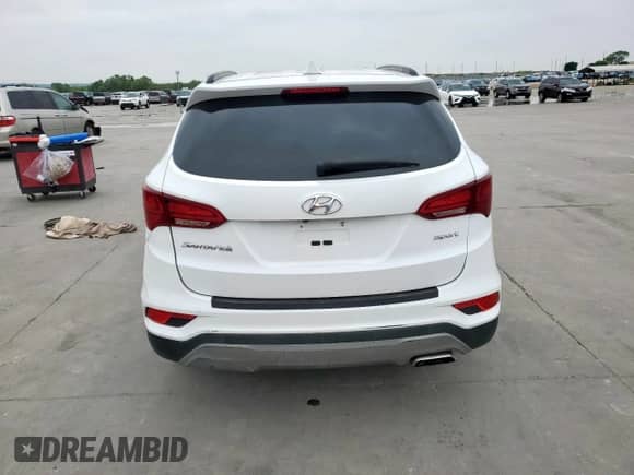 2018 Hyundai Santa Fe 2.4L с VIN 5XYZU3LB3JG528542, выставлен на аукционе Copart как лот 51332015 с пробегом 58 071 миль миль и Списание • Salvage title. История ставок и продаж доступна на DreamBid. Изображение 6.