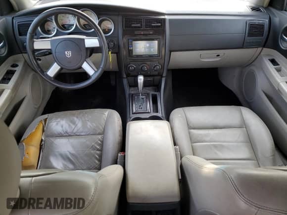 2006 Dodge Charger с VIN 2B3KA43G96H161085, выставлен на аукционе Copart как лот 42266074 с пробегом 201 943 миль миль и Списание • Salvage title. История ставок и продаж доступна на DreamBid. Изображение 8.