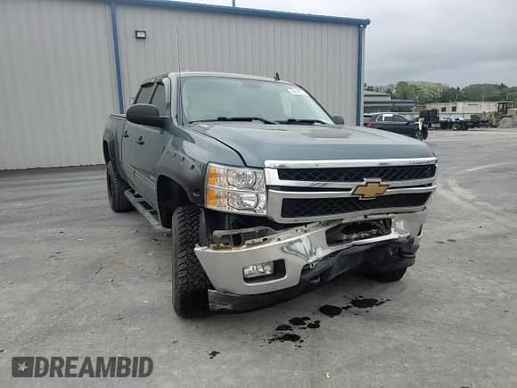 2012 Chevrolet Silverado 2500HD LT with VIN 1GC1KXCG5CF103416, listed as a Copart auction lot 58614575 with 86,968 mi miles and Salvage title. Bid and sale history available at DreamBid. Image 13.