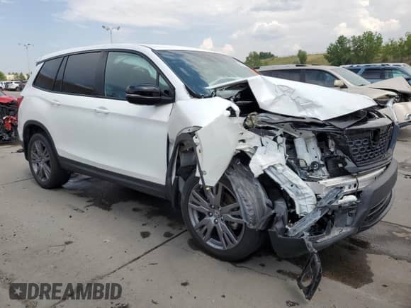 2020 Honda Passport EX-L с VIN 5FNYF8H50LB001588, выставлен на аукционе Copart как лот 65073835 с пробегом Не указан миль и Списание • Salvage title. История ставок и продаж доступна на DreamBid. Изображение 4.