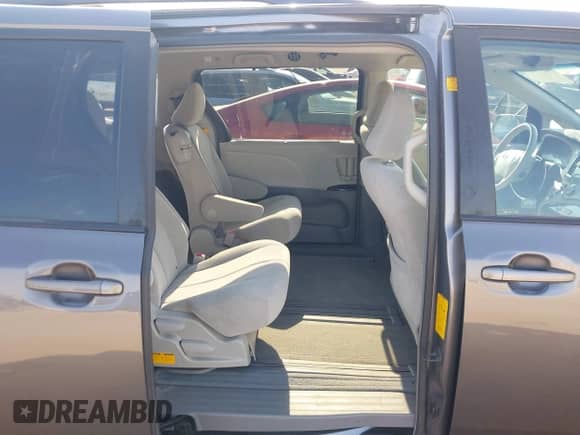 2011 Toyota Sienna LE with VIN 5TDKK3DC5BS125486, listed as a IAAI auction lot 42934003 with 104,158 mi miles and . Bid and sale history available at DreamBid. Image 8.