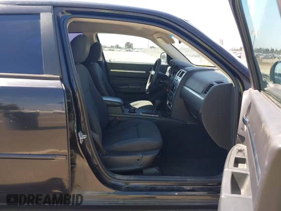 2010 Dodge Charger SXT with VIN 2B3CA3CV6AH227582, listed as a IAAI auction lot 43196146 with 198,848 mi miles and . Bid and sale history available at DreamBid. Image 5.