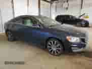 2015 Volvo S60 T6 Drive-E with VIN YV149MFK2F1341338, listed as a Copart auction lot 46083085 with 97,766 mi miles and Salvage title. Bid and sale history available at DreamBid. Image 4.
