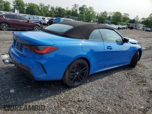 2023 BMW 4 Series 430i xDrive with VIN WBA43AT01PCM32225, listed as a Copart auction lot 60509935 with 25,769 mi miles and Salvage title. Bid and sale history available at DreamBid. Image 3.