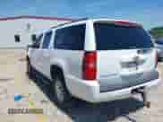 2011 Chevrolet Suburban with VIN 1GNWKMEG3BR250386, listed as a IAAI auction lot 42369109 with 222,821 mi miles and . Bid and sale history available at DreamBid. Image 3.